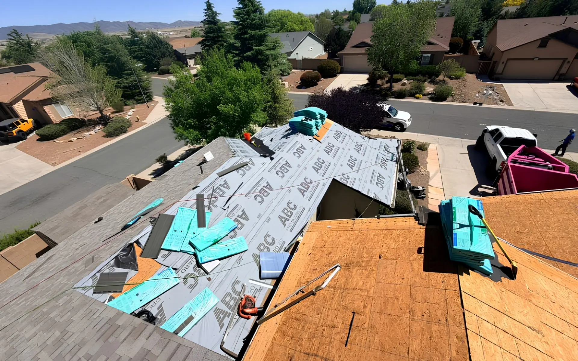 Arizona roof mid-replacement showing underlayment and new decking